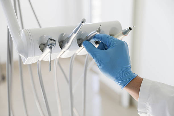 Professional Tooth Extraction technician working in Ardmore, TN